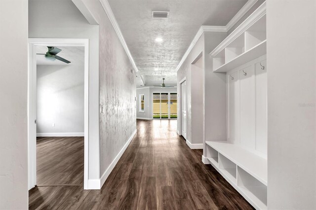 6669 SW 10th Ln, Gainesville, FL 32607 - mudroom with a ceiling fan, crown molding, wood finished floors, and baseboards