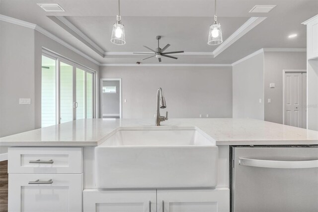6669 SW 10th Ln, Gainesville, FL 32607 - kitchen with stainless steel dishwasher, a sink, a tray ceiling, ceiling fan, and open floor plan