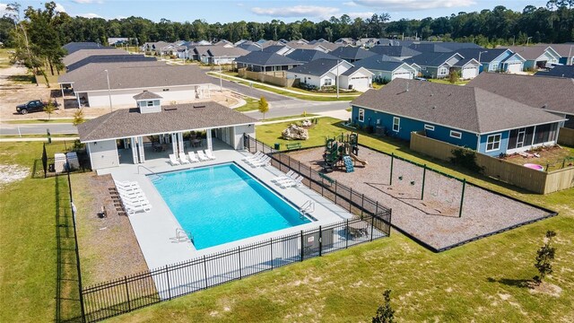 6669 SW 10th Ln, Gainesville, FL 32607 - community pool featuring a residential view and a patio area