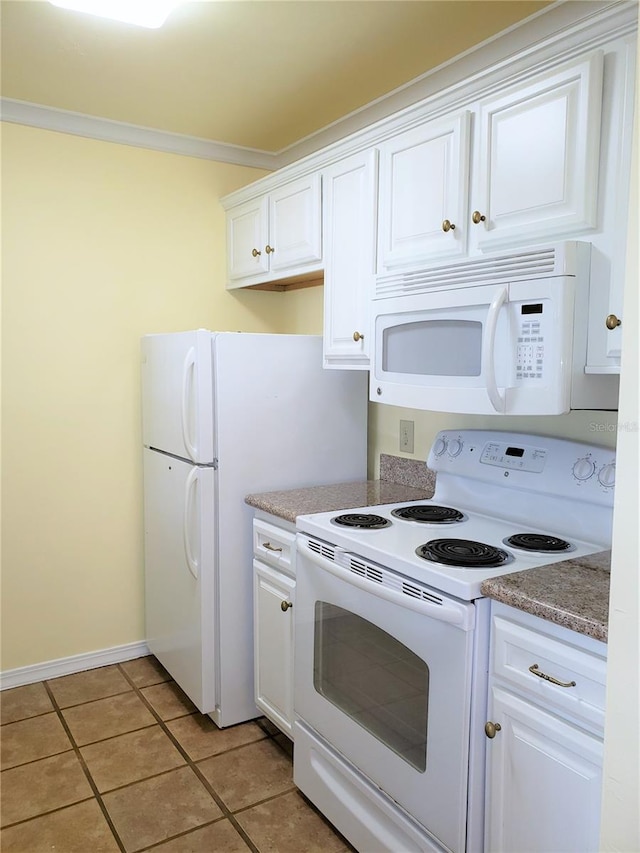 2360 SW Archer Rd Unit 404, Gainesville, FL 32608 - kitchen with white appliances, white cabinets, light tile patterned flooring, crown molding, and baseboards