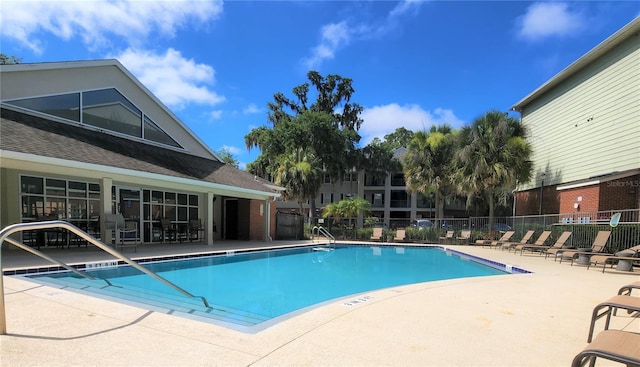 2360 SW Archer Rd Unit 404, Gainesville, FL 32608 - community pool with a patio area