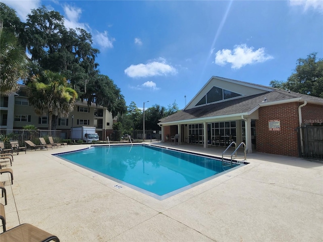 2360 SW Archer Rd Unit 404, Gainesville, FL 32608 - community pool with a patio area