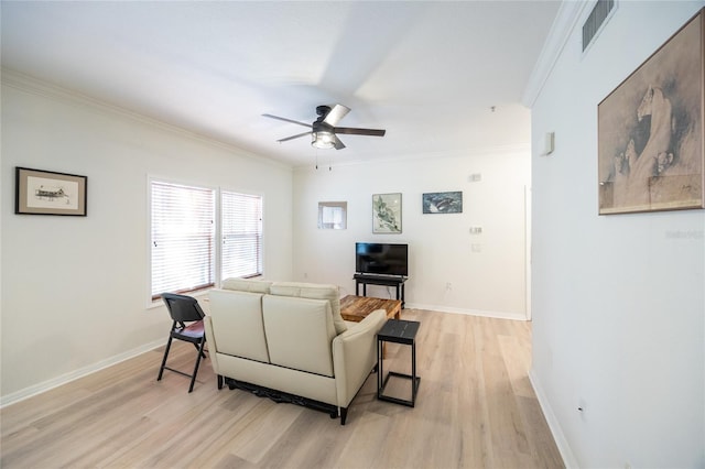 4850 SW 91st Ter Unit P201, Gainesville, FL 32608 - living room with ornamental molding, ceiling fan, light wood-style flooring, and baseboards