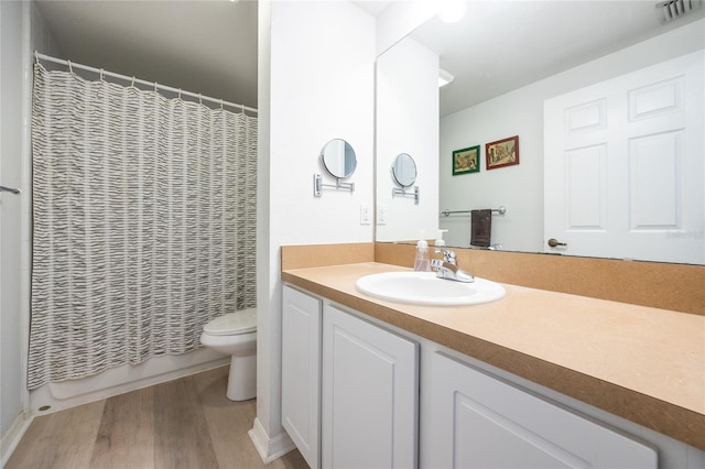 4850 SW 91st Ter Unit P201, Gainesville, FL 32608 - full bath with toilet, vanity, and wood finished floors