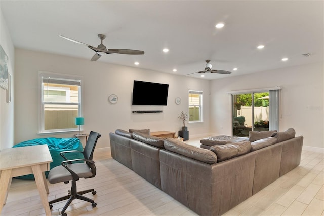 24624 NW 7th Ln, Newberry, FL 32669 - living room with a ceiling fan, light wood-style floors, recessed lighting, and baseboards