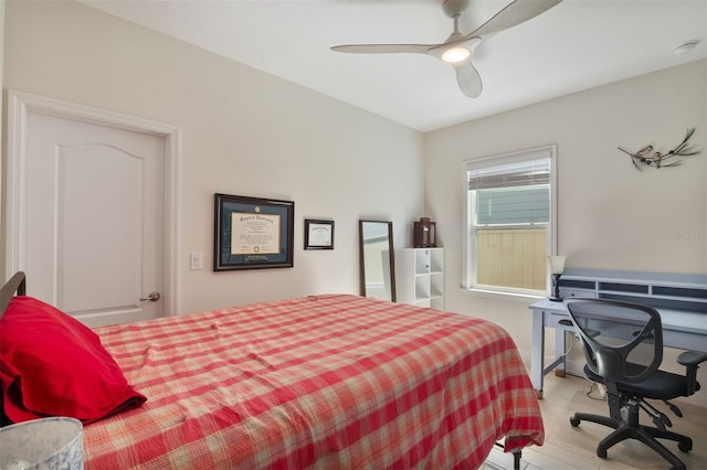 24624 NW 7th Ln, Newberry, FL 32669 - bedroom with wood finished floors, a ceiling fan, and baseboards