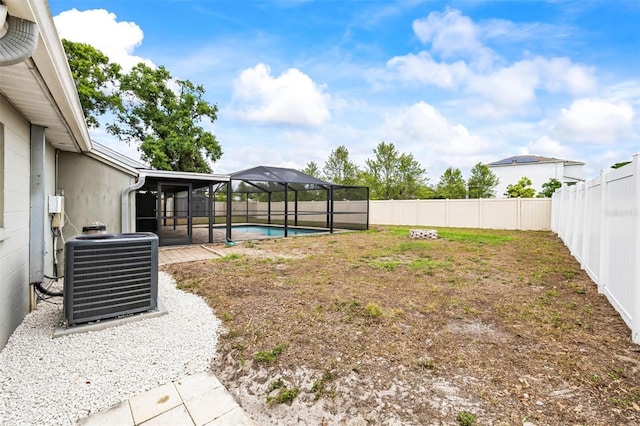 2204 Krista Ln, Brandon, FL 33511 - fenced backyard with cooling unit and a sunroom