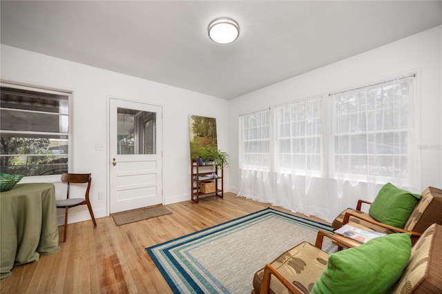 1617 NE 8th St, Gainesville, FL 32609 - sitting room featuring wood finished floors and baseboards