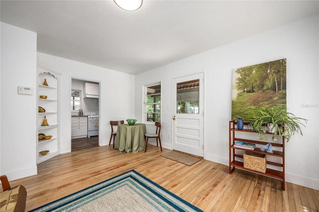 1617 NE 8th St, Gainesville, FL 32609 - living area with hardwood / wood-style floors and baseboards