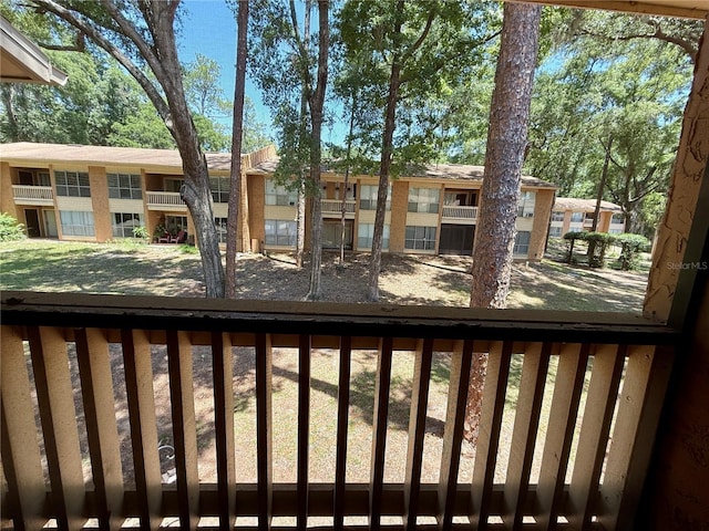 1810 NW 23rd Blvd Unit 203, Gainesville, FL 32605 - view of yard featuring a balcony and a residential view