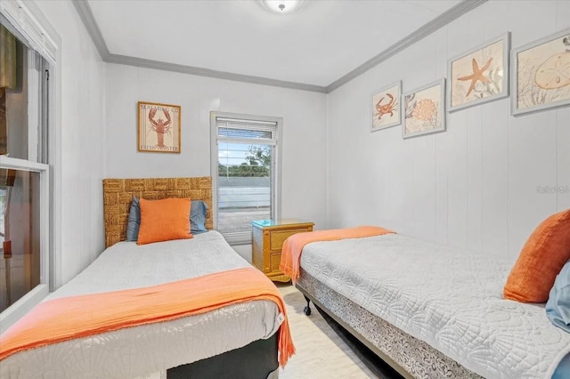 915 S Broadway Unit Ab, Englewood, FL 34223 - bedroom featuring crown molding and wood finished floors