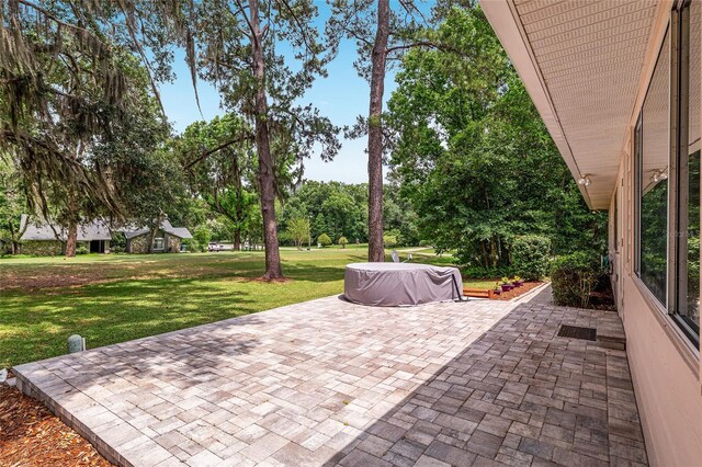 6806 NW 105th Ave, Alachua, FL 32615 - view of patio / terrace featuring view of wooded area