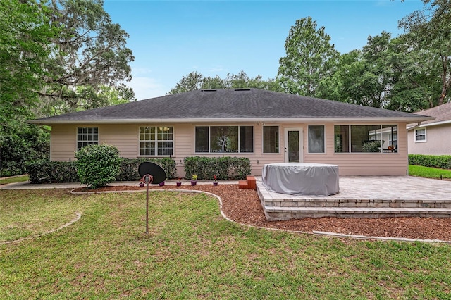 6806 NW 105th Ave, Alachua, FL 32615 - rear view of property with a patio area and a yard