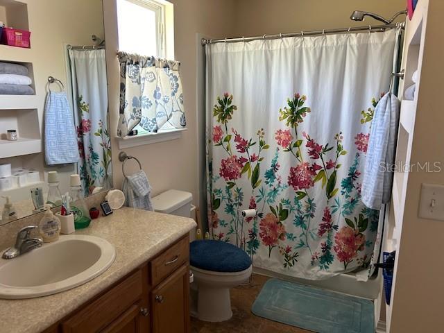 15628 NW 137th Way, Alachua, FL 32615 - full bath featuring toilet and vanity