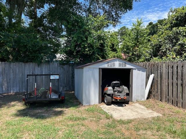 15628 NW 137th Way, Alachua, FL 32615 - view of shed featuring a fenced backyard