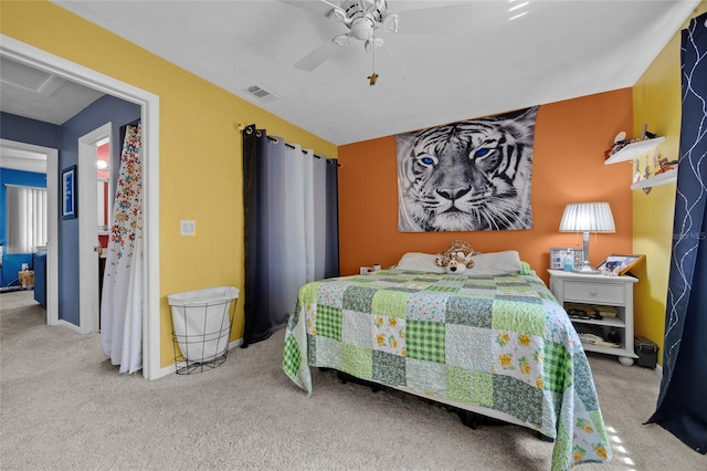 2735 SW 35th Pl Unit 306, Gainesville, FL 32608 - bedroom with carpet, a ceiling fan, and baseboards