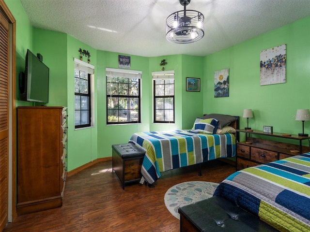 113 Myrtlewood Point Rd, East Palatka, FL 32131 - bedroom featuring wood finished floors, a textured ceiling, and baseboards