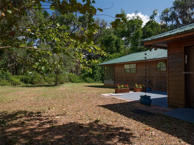 113 Myrtlewood Point Rd, East Palatka, FL 32131 - view of green lawn with a patio