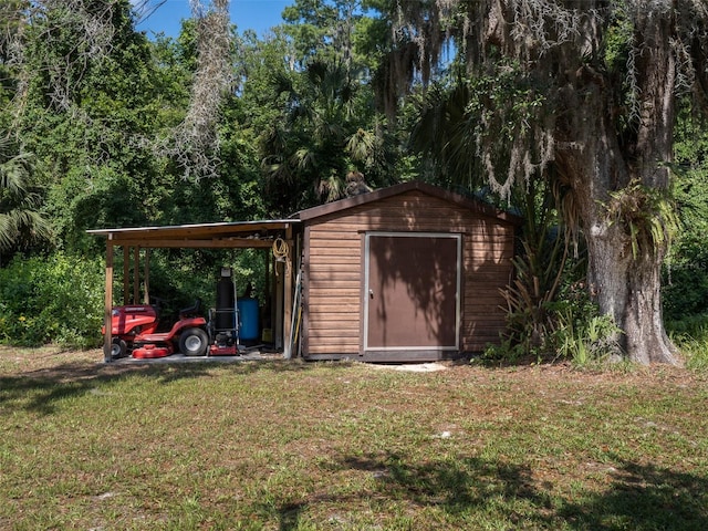 113 Myrtlewood Point Rd, East Palatka, FL 32131 - view of shed with a carport