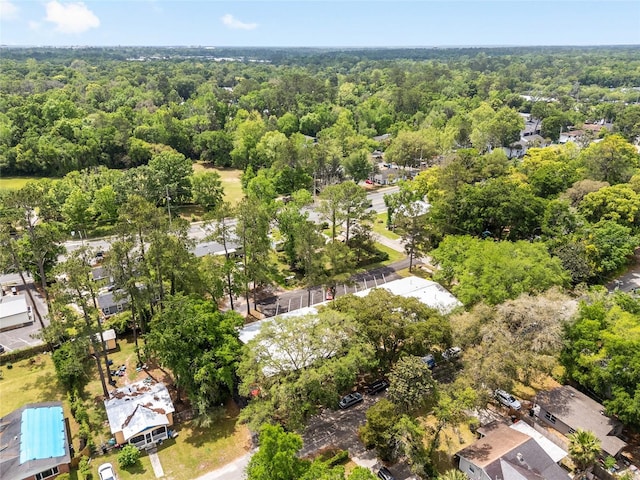 915 NW 40th Ave, Gainesville, Fl, FL 32605 - aerial overview of property's location featuring a heavily wooded area and nearby suburban area