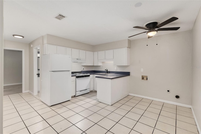 915 NW 40th Ave, Gainesville, Fl, FL 32605 - kitchen featuring white appliances, a sink, ceiling fan, and baseboards