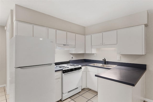 915 NW 40th Ave, Gainesville, Fl, FL 32605 - kitchen featuring white appliances, a sink, under cabinet range hood, dark countertops, and light tile patterned flooring