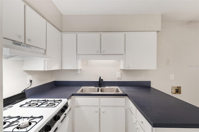 915 NW 40th Ave, Gainesville, Fl, FL 32605 - kitchen featuring a sink, under cabinet range hood, white cabinetry, and white range with gas cooktop