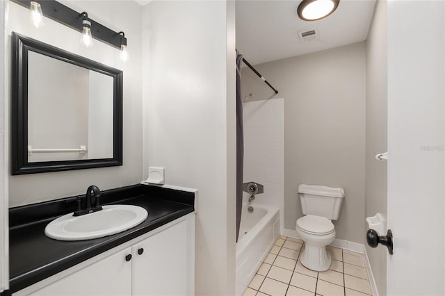 915 NW 40th Ave, Gainesville, Fl, FL 32605 - bathroom featuring tile patterned flooring, vanity, toilet, shower / washtub combination, and baseboards
