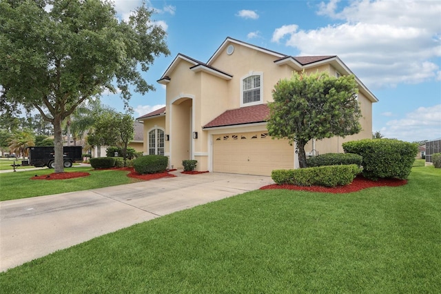 1726 Chatham Village Dr, Fleming Island, FL 32003 - view of front of house featuring an attached garage, driveway, a front yard, and stucco siding
