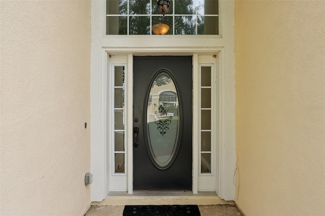 1726 Chatham Village Dr, Fleming Island, FL 32003 - doorway to property with stucco siding