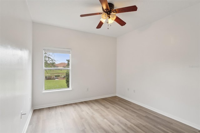 1726 Chatham Village Dr, Fleming Island, FL 32003 - spare room with light wood-style flooring, baseboards, and a ceiling fan