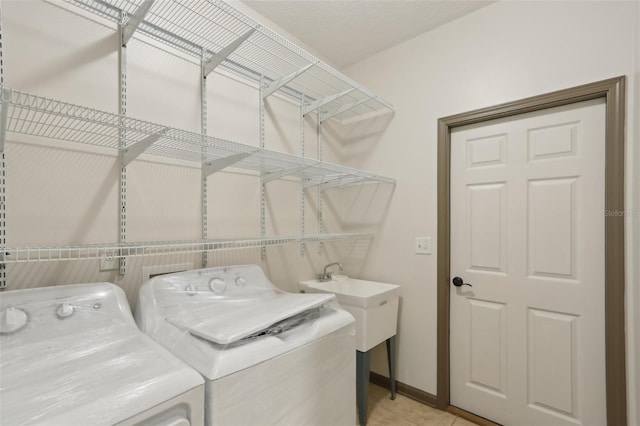 1726 Chatham Village Dr, Fleming Island, FL 32003 - washroom with washing machine and clothes dryer and baseboards