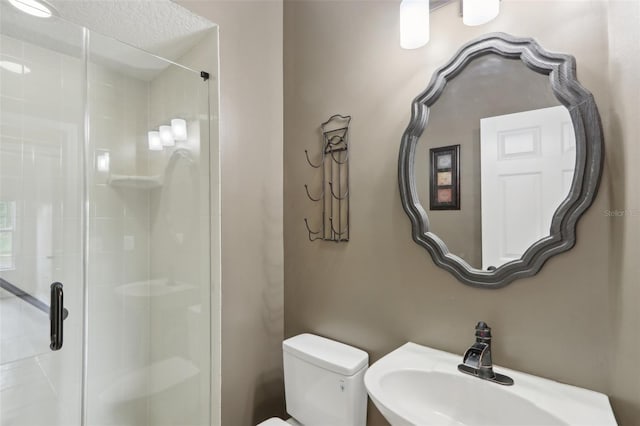 1726 Chatham Village Dr, Fleming Island, FL 32003 - bathroom with a sink, toilet, and a stall shower