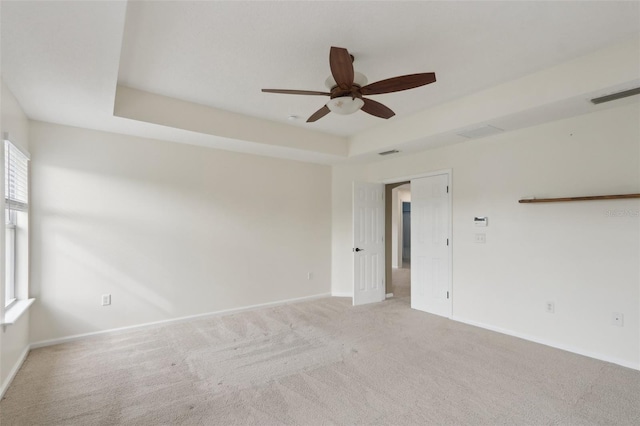 1726 Chatham Village Dr, Fleming Island, FL 32003 - unfurnished room featuring a ceiling fan, light carpet, healthy amount of natural light, and baseboards