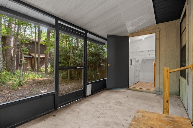 6912 SW 45th Ave, Gainesville, FL 32608 - unfurnished sunroom with lofted ceiling and washing machine and clothes dryer