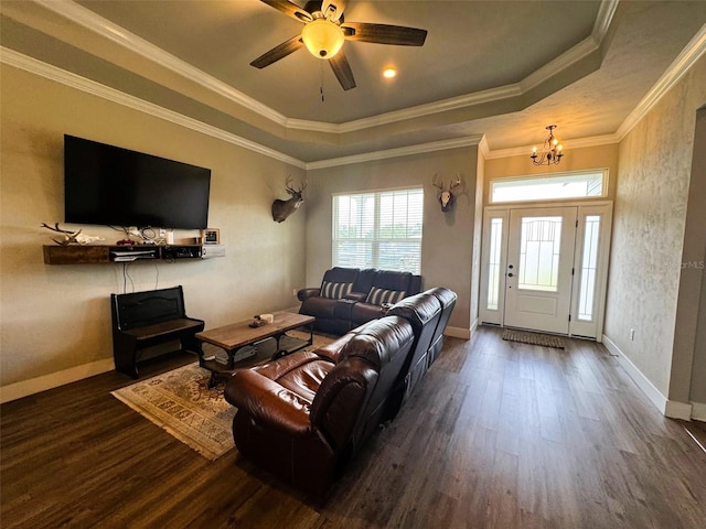 6180 SW 83rd Pl, Trenton, FL 32693 - living area with wood finished floors, a chandelier, a tray ceiling, baseboards, and crown molding