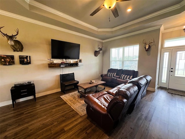 6180 SW 83rd Pl, Trenton, FL 32693 - living room featuring a raised ceiling, wood finished floors, ceiling fan, baseboards, and ornamental molding