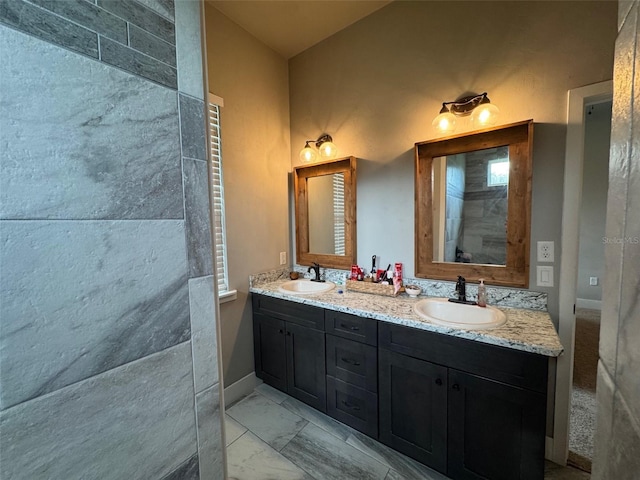 6180 SW 83rd Pl, Trenton, FL 32693 - full bathroom featuring double vanity, marble finish floors, and baseboards