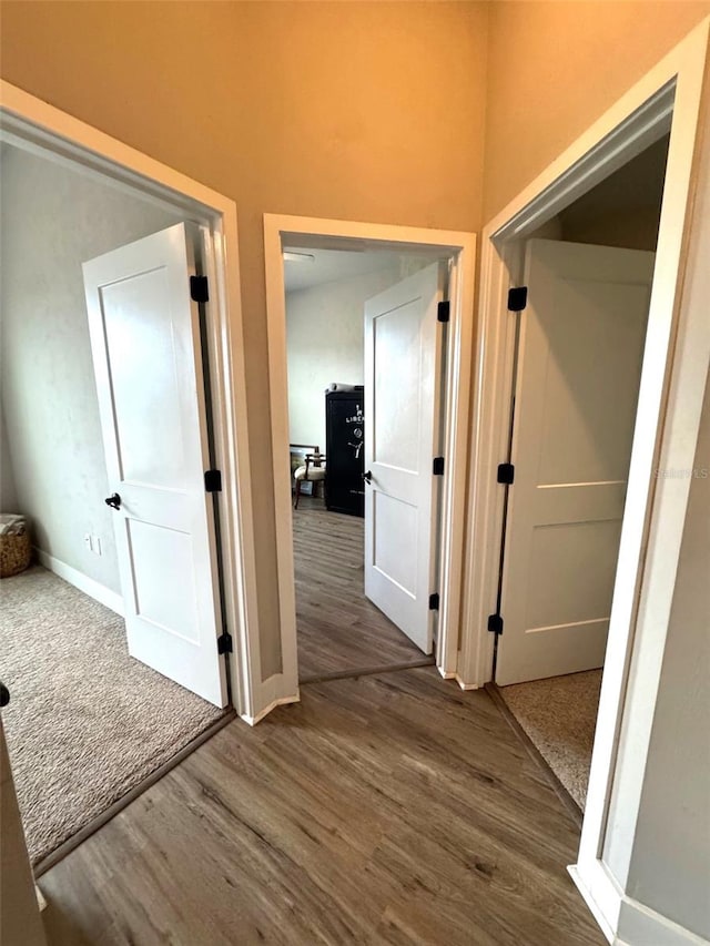 6180 SW 83rd Pl, Trenton, FL 32693 - hallway with dark wood-type flooring and baseboards
