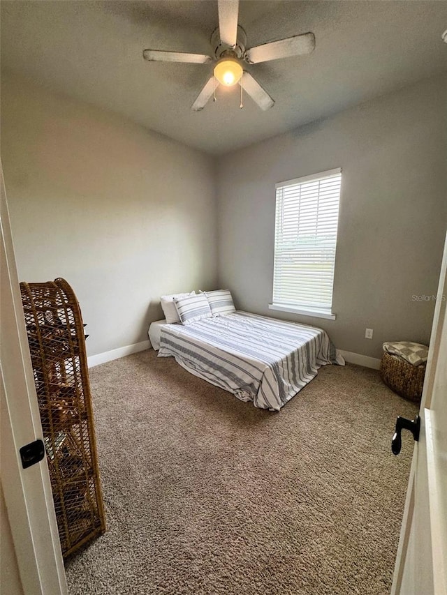 6180 SW 83rd Pl, Trenton, FL 32693 - bedroom featuring carpet flooring, baseboards, and ceiling fan