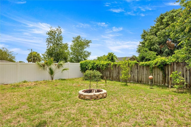 680 NW 67th Pl, Ocala, FL 34475 - view of yard featuring an outdoor fire pit