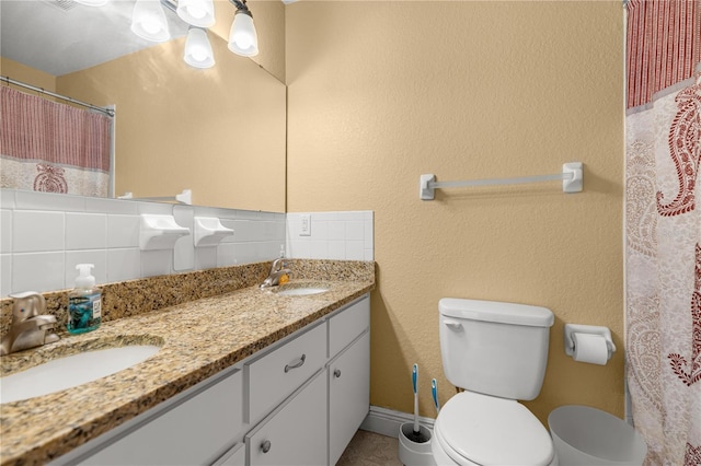 680 NW 67th Pl, Ocala, FL 34475 - full bath featuring double vanity, toilet, and decorative backsplash