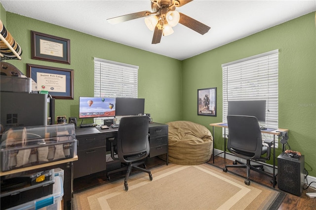 680 NW 67th Pl, Ocala, FL 34475 - office area with wood finished floors, ceiling fan, and a textured wall