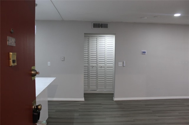 1700 SW 16th Ct Unit J21, Gainesville, FL 32608 - spare room with baseboards, wood finished floors, and recessed lighting