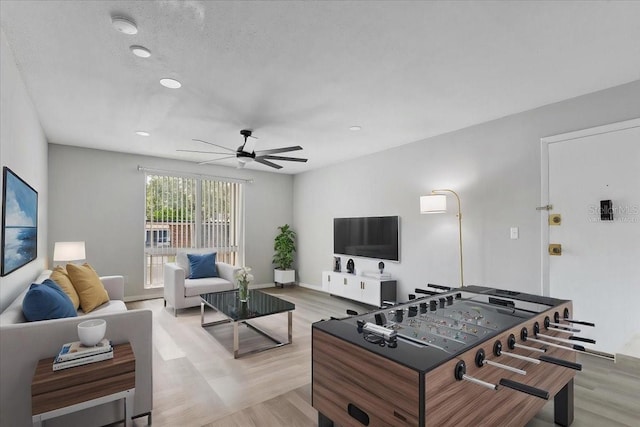 1700 SW 16th Ct Unit J21, Gainesville, FL 32608 - living room featuring light wood-style floors, ceiling fan, and recessed lighting