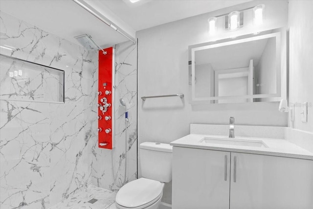 1700 SW 16th Ct Unit J21, Gainesville, FL 32608 - bathroom with vanity, a marble finish shower, and toilet
