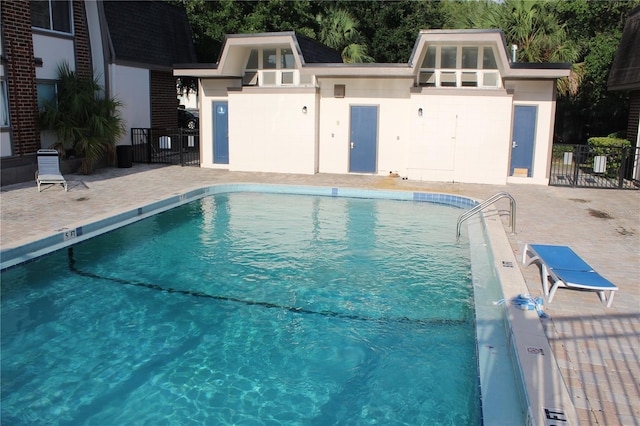 1700 SW 16th Ct Unit J21, Gainesville, FL 32608 - community pool featuring a patio area
