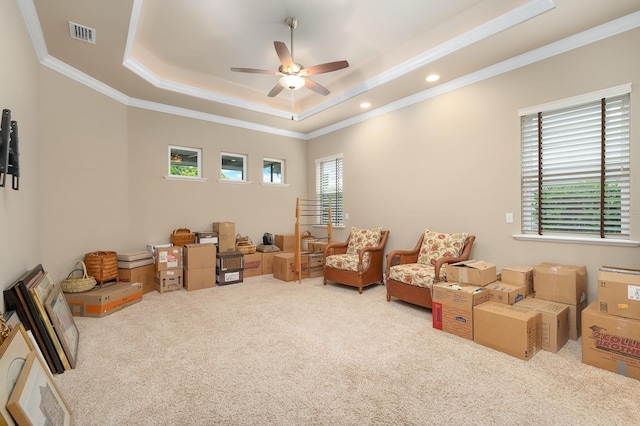 2638 SW 118th Ter, Gainesville, FL 32608 - sitting room featuring carpet floors, ceiling fan, a raised ceiling, ornamental molding, and recessed lighting