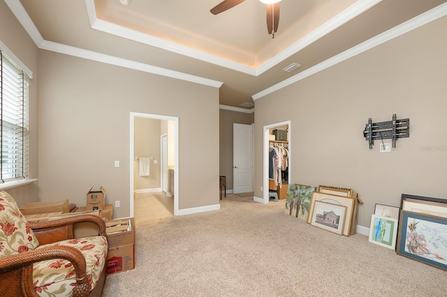 2638 SW 118th Ter, Gainesville, FL 32608 - sitting room with a raised ceiling, carpet, healthy amount of natural light, crown molding, and a ceiling fan