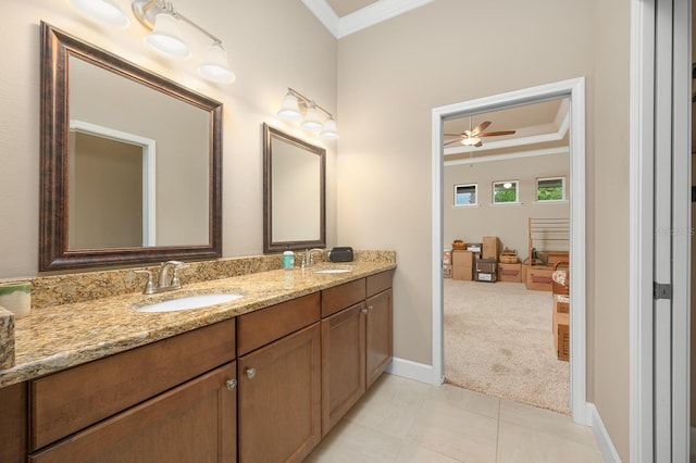 2638 SW 118th Ter, Gainesville, FL 32608 - full bath featuring crown molding, double vanity, tile patterned floors, a ceiling fan, and baseboards